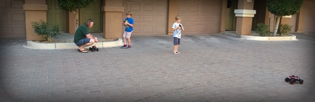 Boys with remote trucks